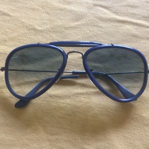 Blue Rayban sunglasses.